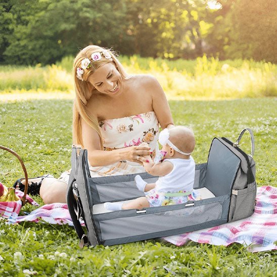 sac à dos à langer avec lit bébé pour voyage