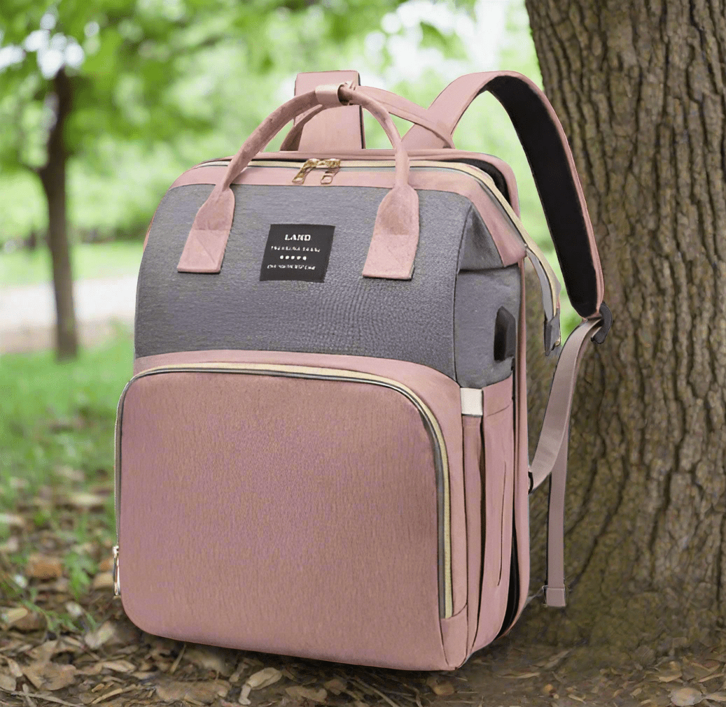 sac à dos à langer avec lit bébé rose