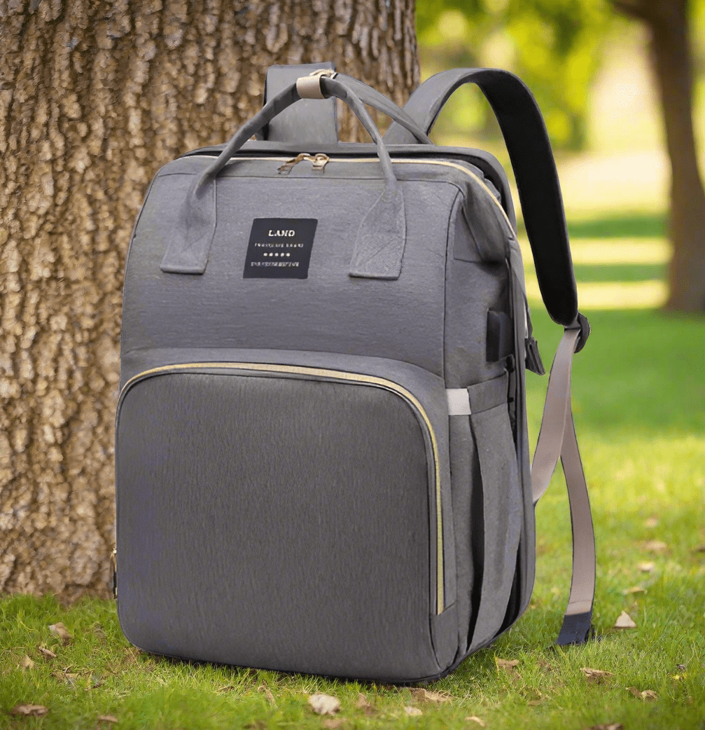 sac à dos à langer avec lit bébé gris